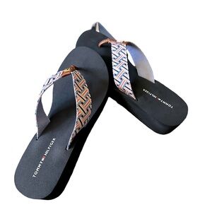 casual style in Tommy Hilfiger's Candis flip-flop sandals.